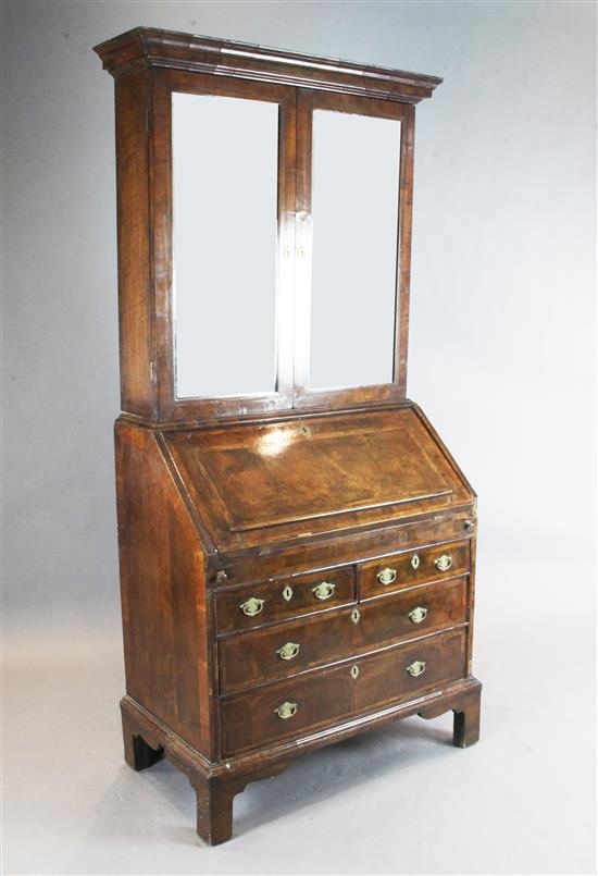 An early 18th century walnut bureau bookcase, W.3ft 3in. D.1ft 9in. H.6ft 8in.